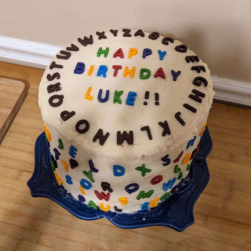 Alphabet cake reading Happy Birthday Luke